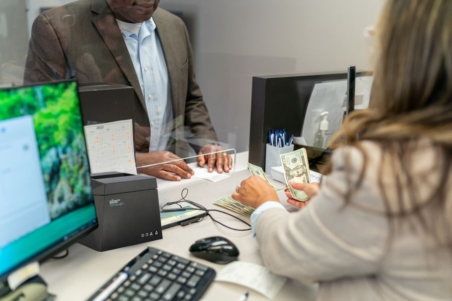 Bank printers by Star Micronics at a teller window