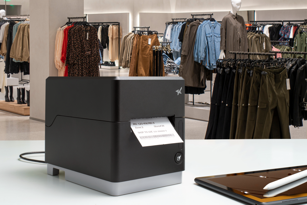 The mC-Label3 multifunction label and receipt printer in a retail clothing setting