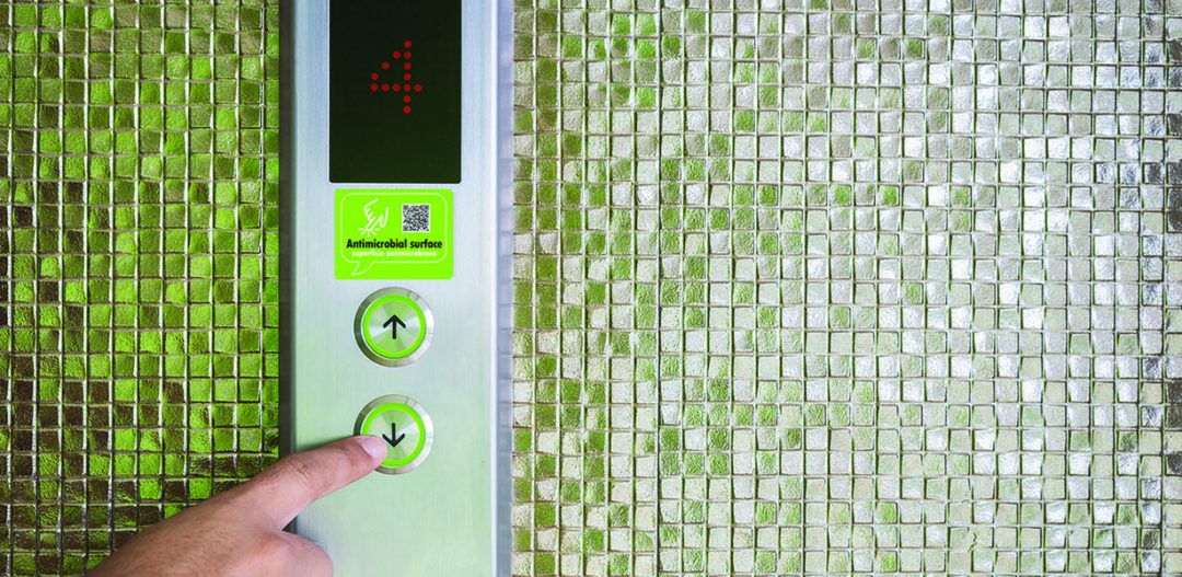 Antimicrobial covers on elevator button