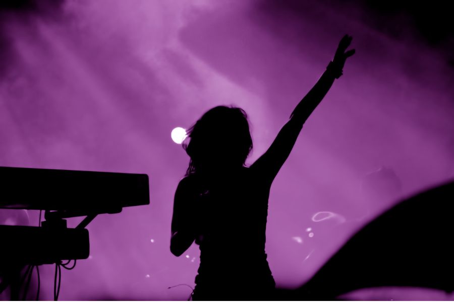 Silhouette of female concert artist onstage. Might be Taylor Swift.