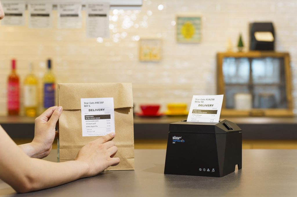 The TSP143IV SK linerless sticky label printer is ideal for QSRs, takeout, deliveries, and more.