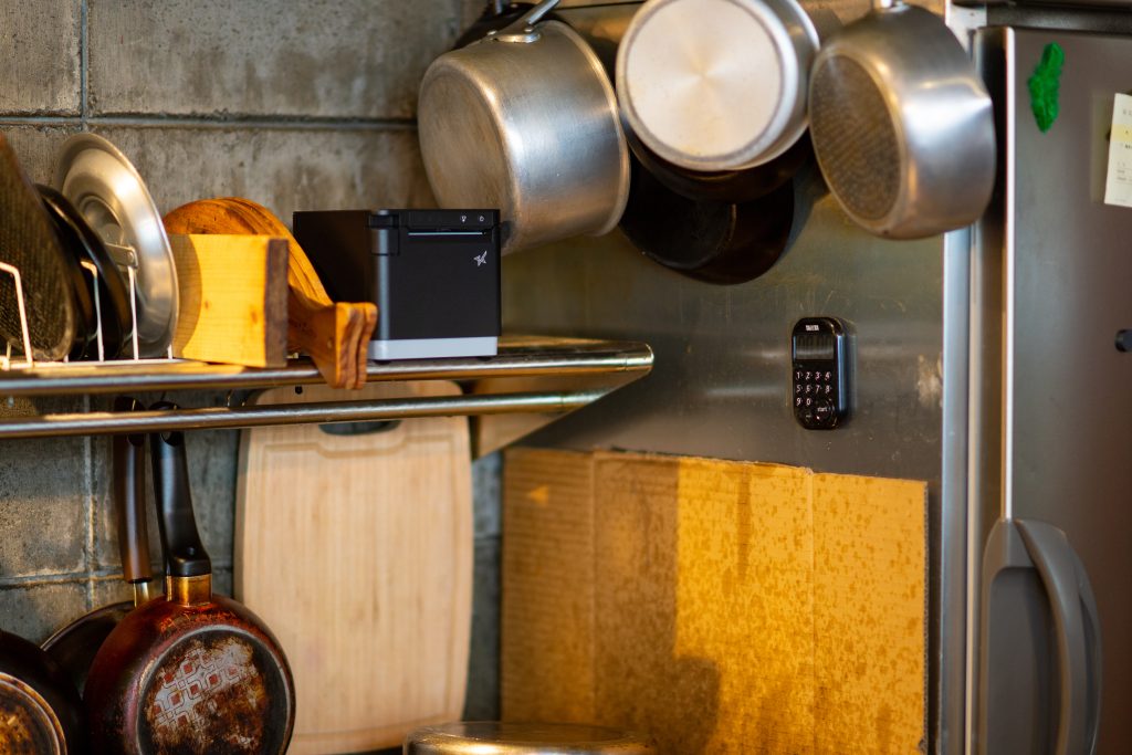 The mC-Print3 thermal kitchen printer in a modern heat-controlled environment.